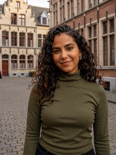 Margaux, 27, Belgian woman on a Ghent cobblestone street - meet Belgian singles on Cdleusa